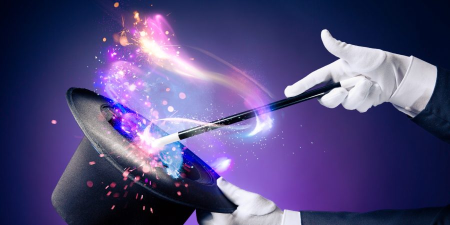 high-contrast-image-of-magician-hand-with-magic-wand-picture-id537316429