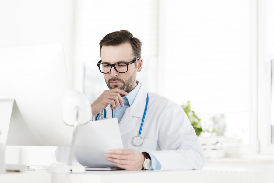 Doctor wirking in his office